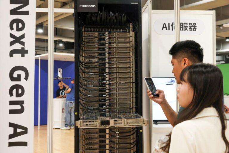 iPhone maker Hon Hai maintains revenue recovery with help from AI E0aebb232652ebb6db93741b582895a5.jpeg