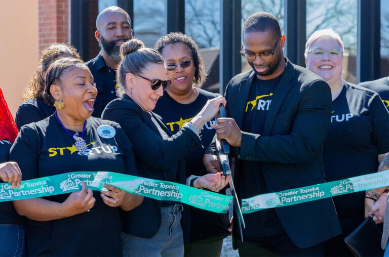 Cutting the ribbon on omnis topeka startup community.jpg