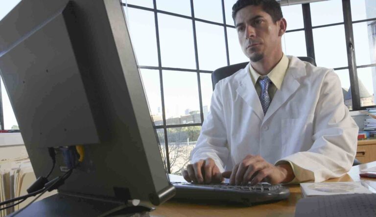 The use of Shadow AI tools and chatbots is prevalent in healthcare facilities. DoctorComputer.John20M20Lund20Photography.jpg